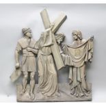 A 19TH CENTURY GERMAN CARVED PINE PANEL "VERONICA'S VEIL", featuring Christ bearing the cross with a