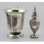 AN EDWARDIAN SILVER CHRISTENING MUG with flared rim, "C" scroll handle and domed platform foot,