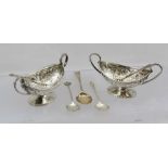 JAMES WAKELY & FRANK CLARKE WHEELER A PAIR OF LATE VICTORIAN SILVER SALTS, having repousse