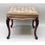 A LATE 19TH/EARLY 20TH CENTURY MAHOGANY SQUARE TOPPED STOOL, having decorative wool work pad top