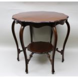 AN EDWARDIAN MAHOGANY CENTRE TABLE, having decorative edge, on tapering supports with undertier,