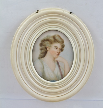 A 19TH CENTURY PORTRAIT MINIATURE, a bust length image of Mrs Willatts, after Romney, a