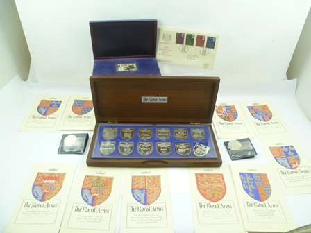 A SET OF TWELVE ELIZABETH II SILVER SHIELD INGOTS, "The Royal Arms Collection" produced by the