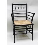 MORRIS & COMPANY OF SUSSEX A 19TH CENTURY EBONISED SUSSEX STYLE SIDE ARMCHAIR, with bobbin turned