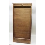 AN "ASTROLA" EDWARDIAN OAK TAMBOUR DOOR CABINET, with press button releasing door to reveal slides