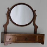 A 19TH CENTURY MAHOGANY BOX BASE SWING DRESSING TABLE MIRROR, the bow front base fitted with three
