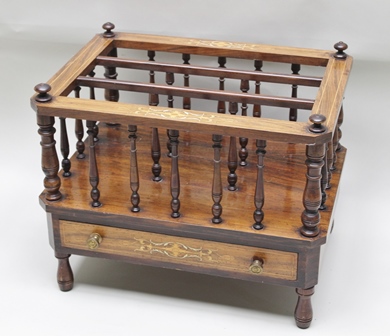 A 19TH CENTURY ROSEWOOD CANTERBURY with decorative inlaid frame, spindle gallery supports, the box