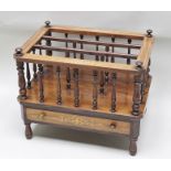 A 19TH CENTURY ROSEWOOD CANTERBURY with decorative inlaid frame, spindle gallery supports, the box