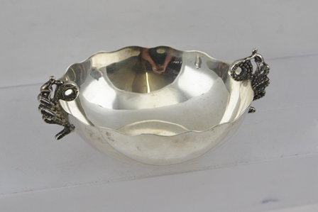 A MEXICAN "STERLING" SILVER SHALLOW BOWL, with decorative cast handles, various stamps to base