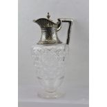 DAVID & LIONEL SPIERS A VICTORIAN SILVER MOUNTED CLARET JUG, the neck of floral and swag decoration,