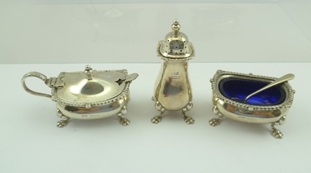 WILLIAM SUCKLING LTD. A MID 20TH CENTURY GEORGIAN DESIGN THREE-PIECE SILVER CONDIMENT SET, gadrooned