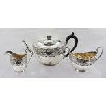 ZACHARIAH, BARRACLOUGH & SONS A LATE VICTORIAN THREE PIECE SILVER TEASET of Georgian bachelor