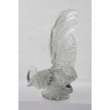 R. LALIQUE "Coq Nain" a rooster form glass car mascot, his tail up, his claws gripping the edge of