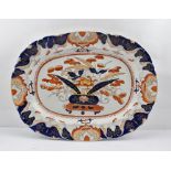 A LARGE MASON'S IRONSTONE MEAT PLATTER, decorated in the Imari palette with a central vase of