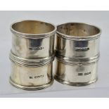 WALKER & HALL A SET OF EARLY TO MID 20TH CENTURY SILVER NAPKIN RINGS, bound reed rims, plain,