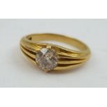 AN 18CT GOLD RING, set with a brilliant cut solitaire diamond