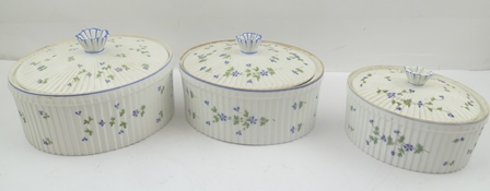 A GRADUATED SET OF THREE LATE 19TH CENTURY MEHUN PORCELAIN OVAL DISHES WITH COVERS, painted in