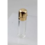 AN 18CT GOLD AND CRYSTAL GLASS PERFUME BOTTLE OF CYLINDRICAL SHAPED FORM, hinged cover with engraved