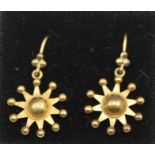 A PAIR OF GOLD COLOURED METAL "STAR" EARRINGS, considered to be 9ct, unmarked