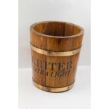 A SECTIONAL WOOD ICE BUCKET (minus liner), with copper bands, inscribed "Kriter Extra Light", 23cm