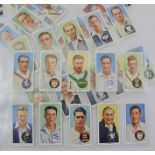 A COMPLETE SET OF JOHN PLAYER & SONS "CRICKETERS 1938" CIGARETTE CARDS (1-50), in "slip in" wallets