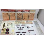 A QUANTITY OF NEW DECALS FOR AIRCRAFT (unused), together with a box of modellers spares,