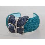 A DESIGNER SILVER AND CRYSTAL SHARK SKIN BRACELET, turquoise bracelet with blue and white crystal