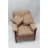 AN EDWARDIAN DEEP-SEATED CLUB STYLE EASY CHAIR, upholstered in a tweed fabric, with similarly