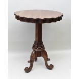 A 19TH CENTURY MAHOGANY WINE TABLE with circular scalloped top, on single faceted column and three