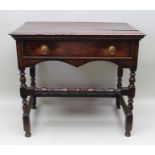 AN 18TH CENTURY OAK SIDE TABLE (with later alterations), having rectangular plank top, over single