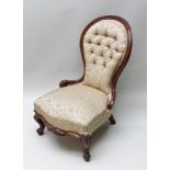 A 19TH CENTURY SHOW WOOD MAHOGANY FRAMED SPOON BACK NURSING CHAIR, with old gold upholstered