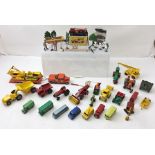 A COLLECTION OF MATCHBOX DIE-CAST VEHICLES including; tractors, dumpers, construction equipment