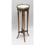 A LATE 20TH CENTURY FRENCH JARDINIERE STAND, octagonal white marble inset top, brass gallery and