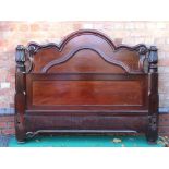 A VICTORIAN MAHOGANY DOUBLE BED FRAME with scrolls and tulip finials