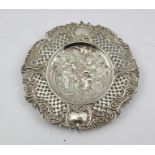 A 19TH CENTURY CONTINENTAL REPOUSSE AND PIERCED SILVER CARD TRAY, to the centre cherubs with musical