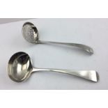 THOMAS & GEORGE HAYTER A GEORGE IV SILVER SAUCE LADLE, with Hanoverian handle, monogrammed, London