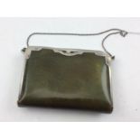 J.C. VICKERY, REGENT STREET, LONDON A SILVER MOUNTED GREEN TANNED LEATHER PURSE, internally fitted