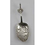 A 19TH CENTURY DUTCH ORNAMENTAL SPOON, lion rampant cast terminal to handle, the bowl embossed