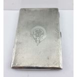 A VICTORIAN SILVER CASE, having engine turned decoration, opens to reveal a blue silk lined interior
