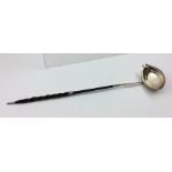 AN 18TH CENTURY SILVER TODDY LADLE, the bowl with pouring lip, fitted with a twisted whale bone