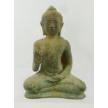 A KHMER BRONZE BUDDHA circa 1800, remains of consecration clay to base, 22.5cm high