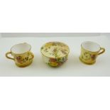 A LATE VICTORIAN ROYAL WORCESTER PORCELAIN MINIATURE TYG, hand painted with flowers on a blush ivory