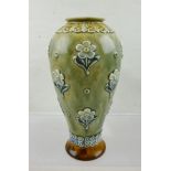 A DOULTON LAMBETH STONEWARE VASE of baluster form, mottled green ground with applied floral