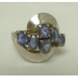 A WHITE GOLD AND SAPPHIRE LADY'S DRESS RING, believed to be 18ct, size H and half