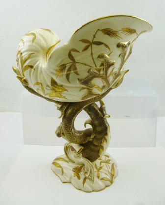 A "FISCHER OF BUDAPEST" ART POTTERY CENTRE PIECE, formed as a shell upon a stem of stylised fish and