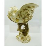 A "FISCHER OF BUDAPEST" ART POTTERY CENTRE PIECE, formed as a shell upon a stem of stylised fish and