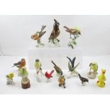 A GOEBEL WAXWING PORCELAIN BIRD together with a collection of Goebel birds (14)