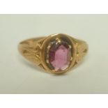 A VICTORIAN 9CT GOLD RING set single amethyst, size L and half