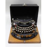 AN ORIGINAL "IMPERIAL" CASED MANUAL TYPEWRITER