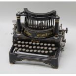 A LATE 19TH/EARLY 20TH CENTURY "SALTER STANDARD" PATENTED MANUAL TYPEWRITER, on cast metal base,